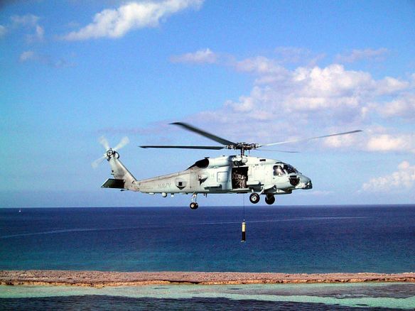 Navy photo. MH-60R “Knighthawk” helicopters conducts an airborne low frequency sonar (ALFS) operation during testing and evaluation